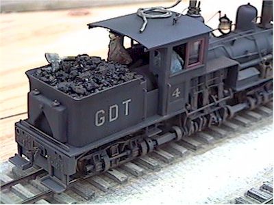 The fuel bunker is topped off with coal