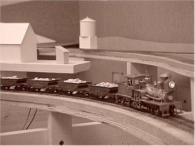 A string of ore cars being pulled by shay GDT #4